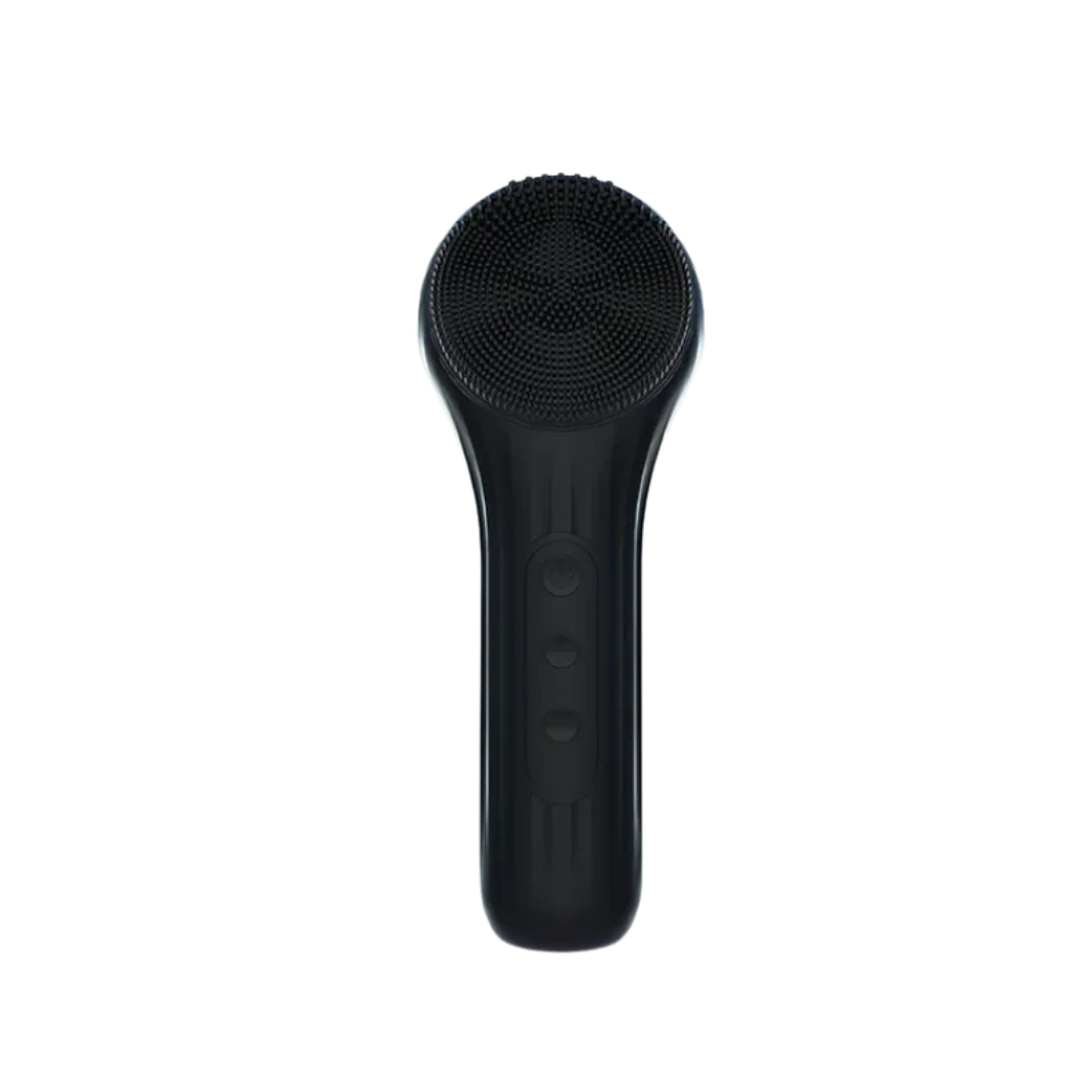 Black facial cleansing brush on a white background