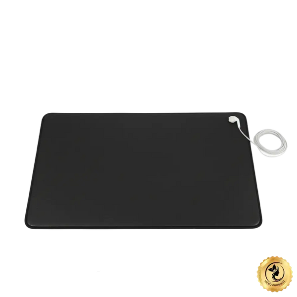 Black heating pad with a white cord on a white background