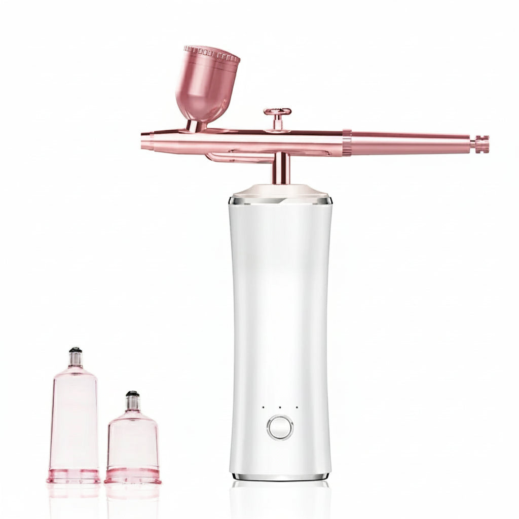 Pink and white electronic device with attachments on a white background