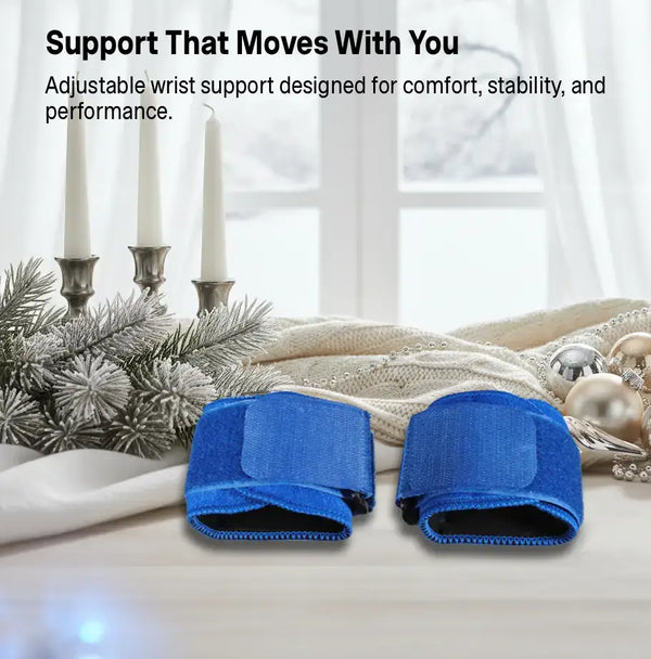 Blue wrist support on a decorative table with candles and Christmas decorations.