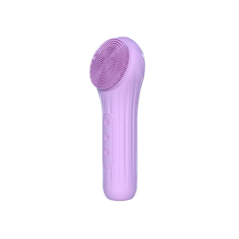 Purple facial cleansing brush on a white background
